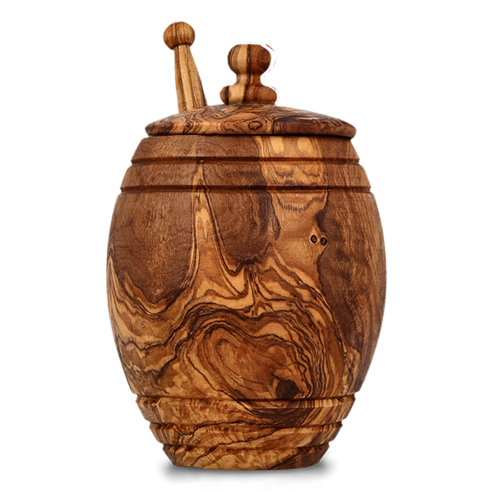 Artisanal wooden honey jar with a lid on a transparent background.