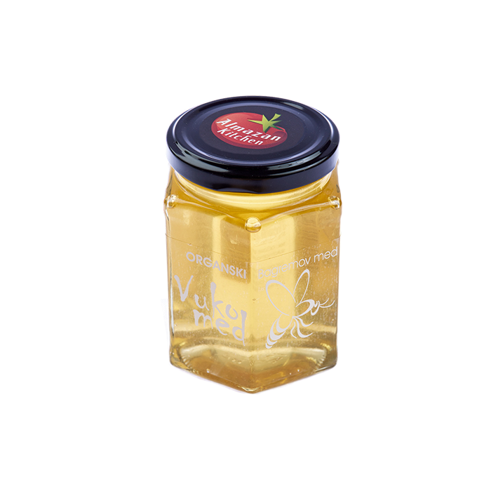 A jar of Almazan Kitchen Organic Serbian Honey on a transparent background.