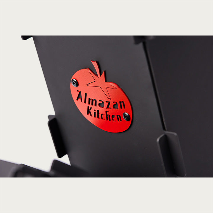 Close up of the Almazan Kitchen logo on the side of the Foldable Rocket Stove.