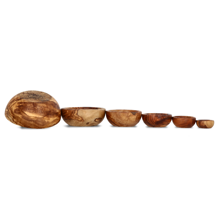 Olive Wood Bowls of different sizes shown next to each other but the largest one is turned over