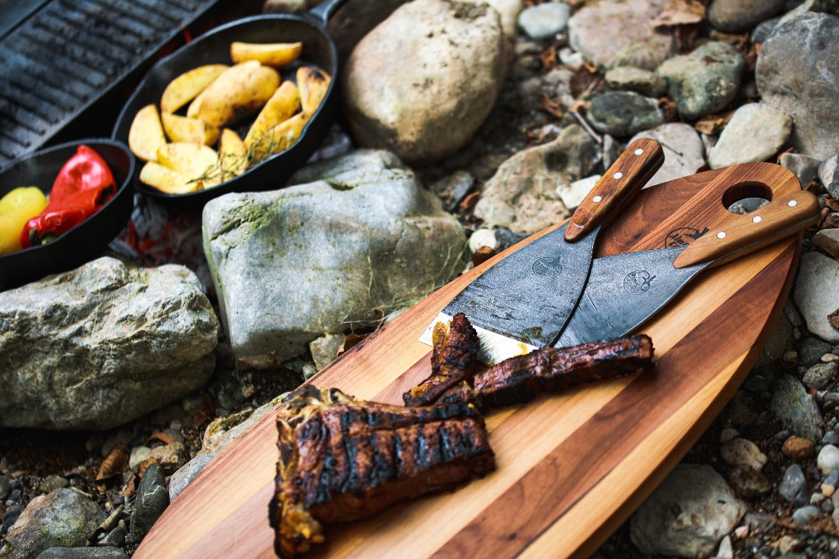 Almazan Kitchen Spatula Set on a cutting board with a piece of meat 