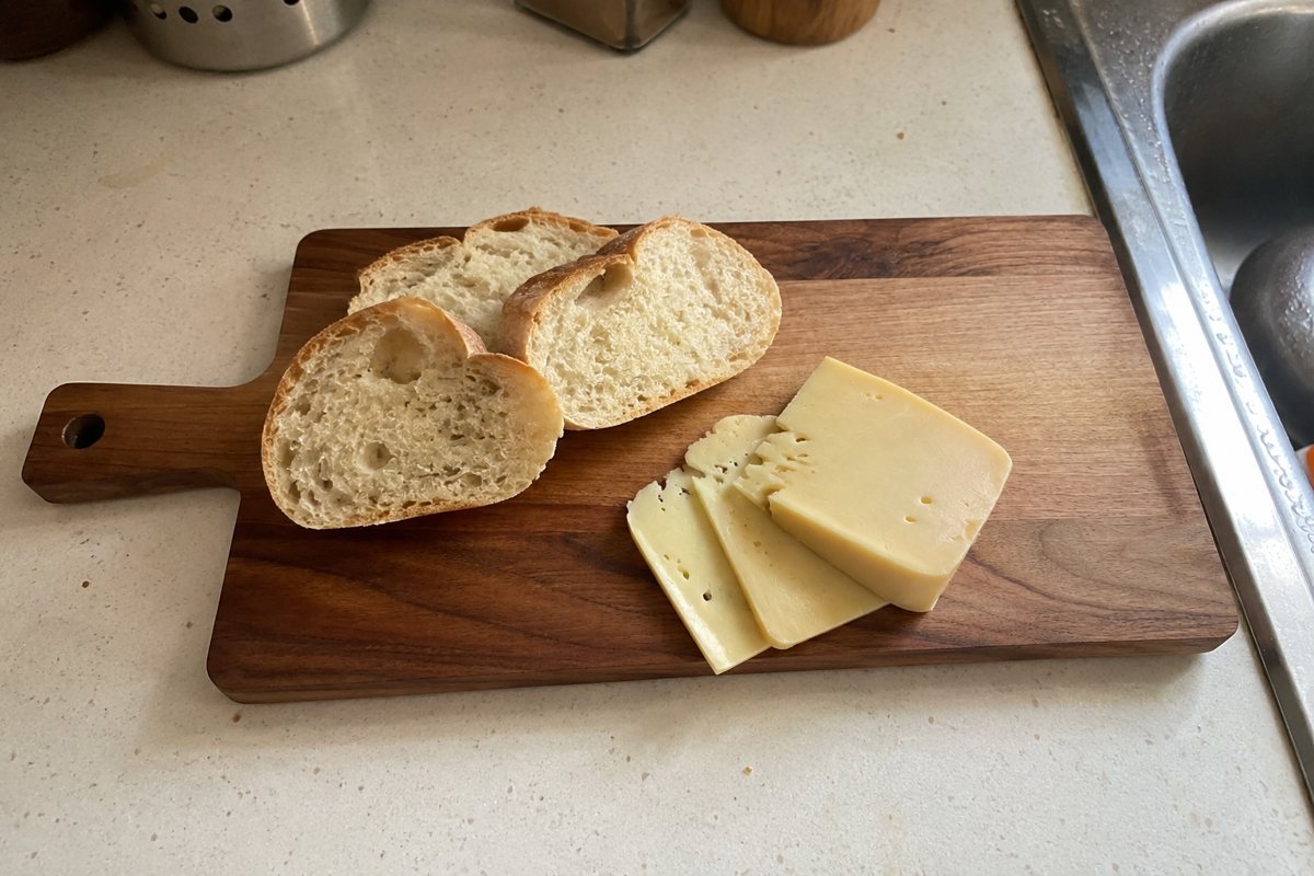 Walnut board with bread and cheese